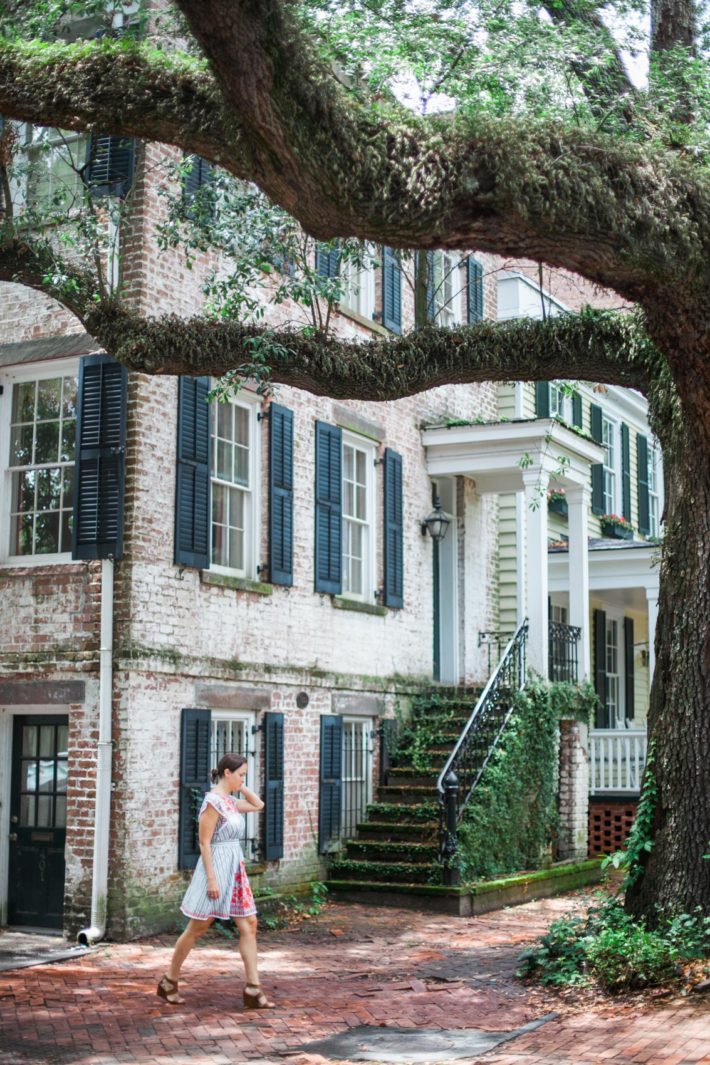 Travel blogger visits Downtown Savannah Georgia wearing Kate Spade dress