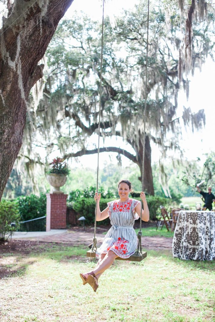 Girl on swing in Savannah Georgia wearing Kate Spade dress