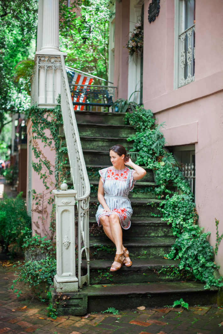 Travel blogger visits Downtown Savannah Georgia wearing Kate Spade dress