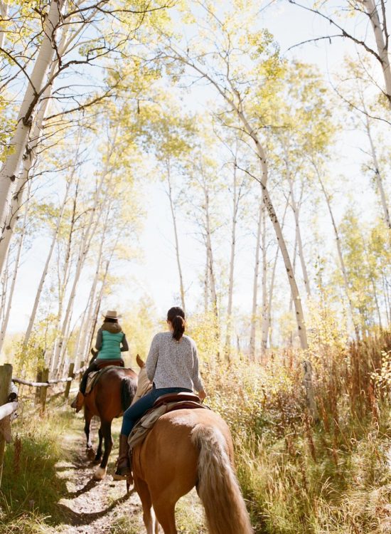 Horseback riding in Autumn Leaves of Grand Teton National Park