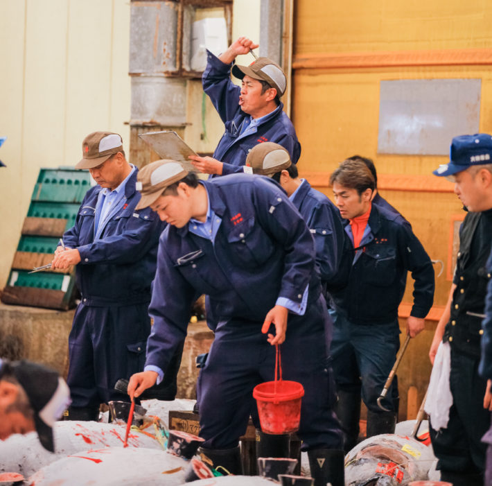 Auctioneer at Tsukiji Fish Market Auction in Tokyo