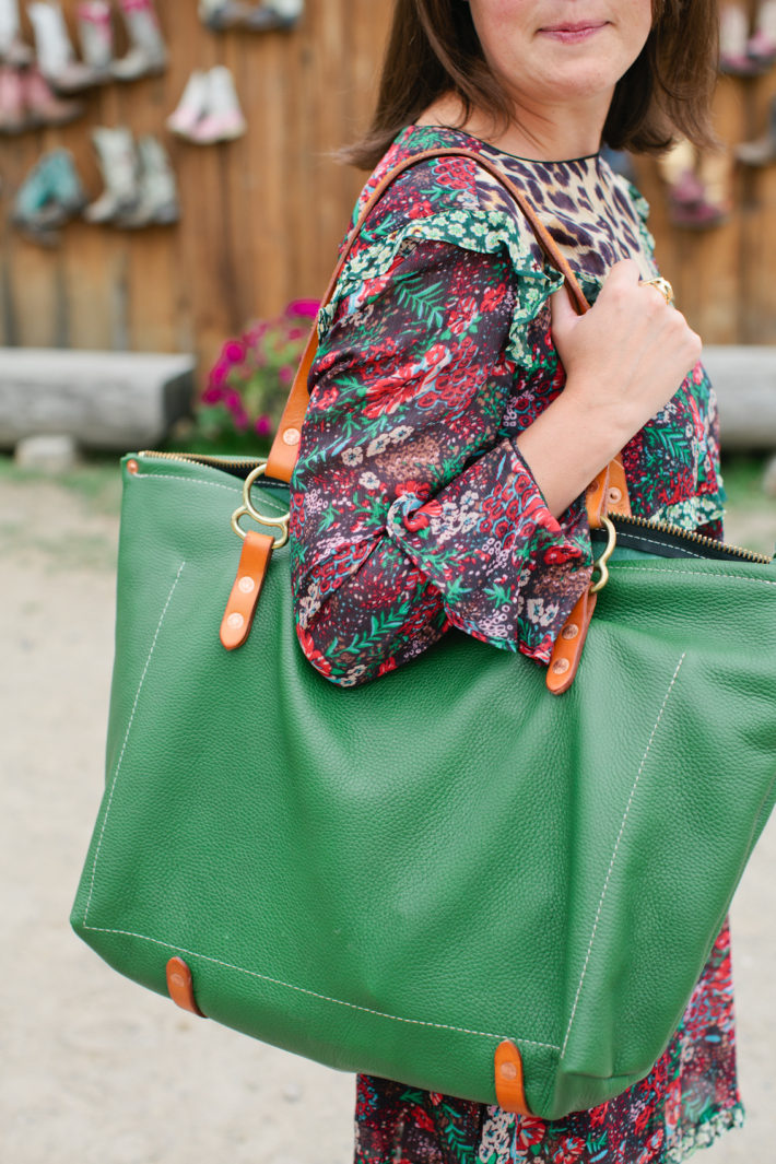 Jackson Hole Blogger at Puzzleface Ranch showcasing Western Style and a Copperdot handmade bag