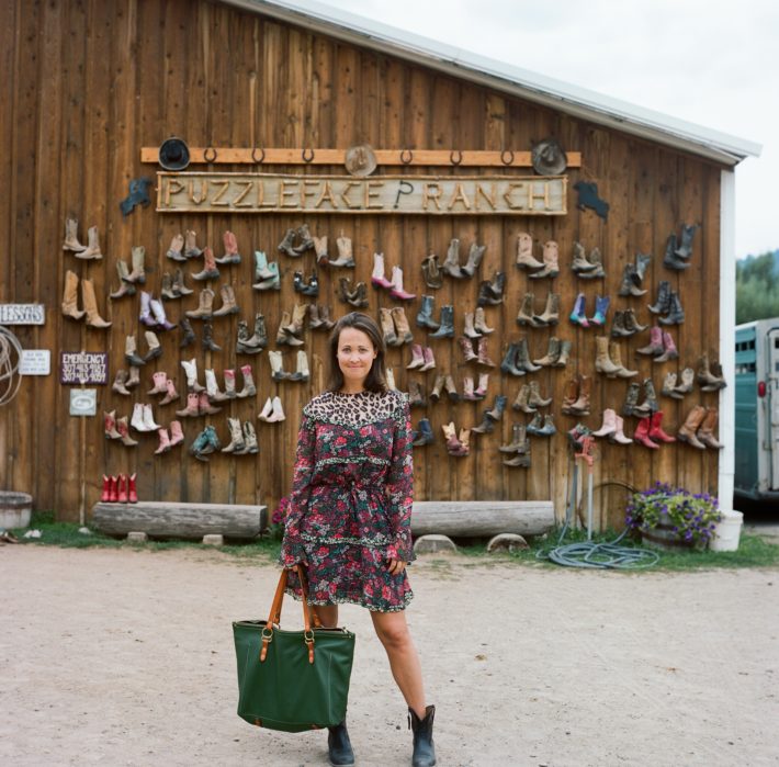 Jackson Hole Blogger at Puzzleface Ranch showcasing Western Style and a Copperdot handmade bag