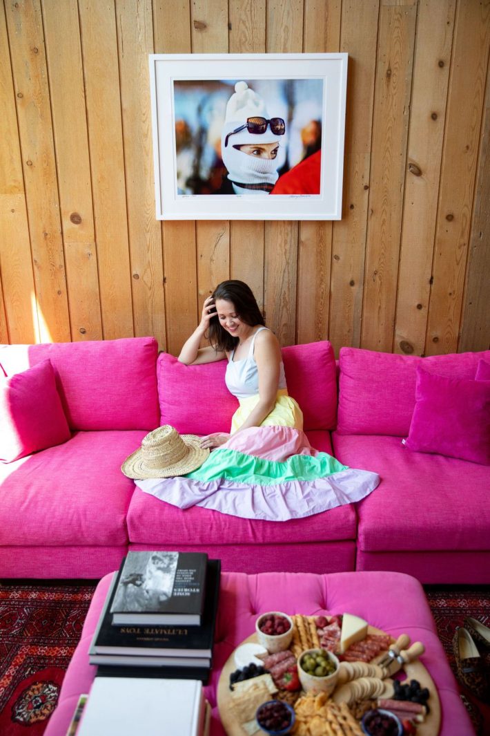 Jackson Hole blogger at Sidereal Haus on big pink couch