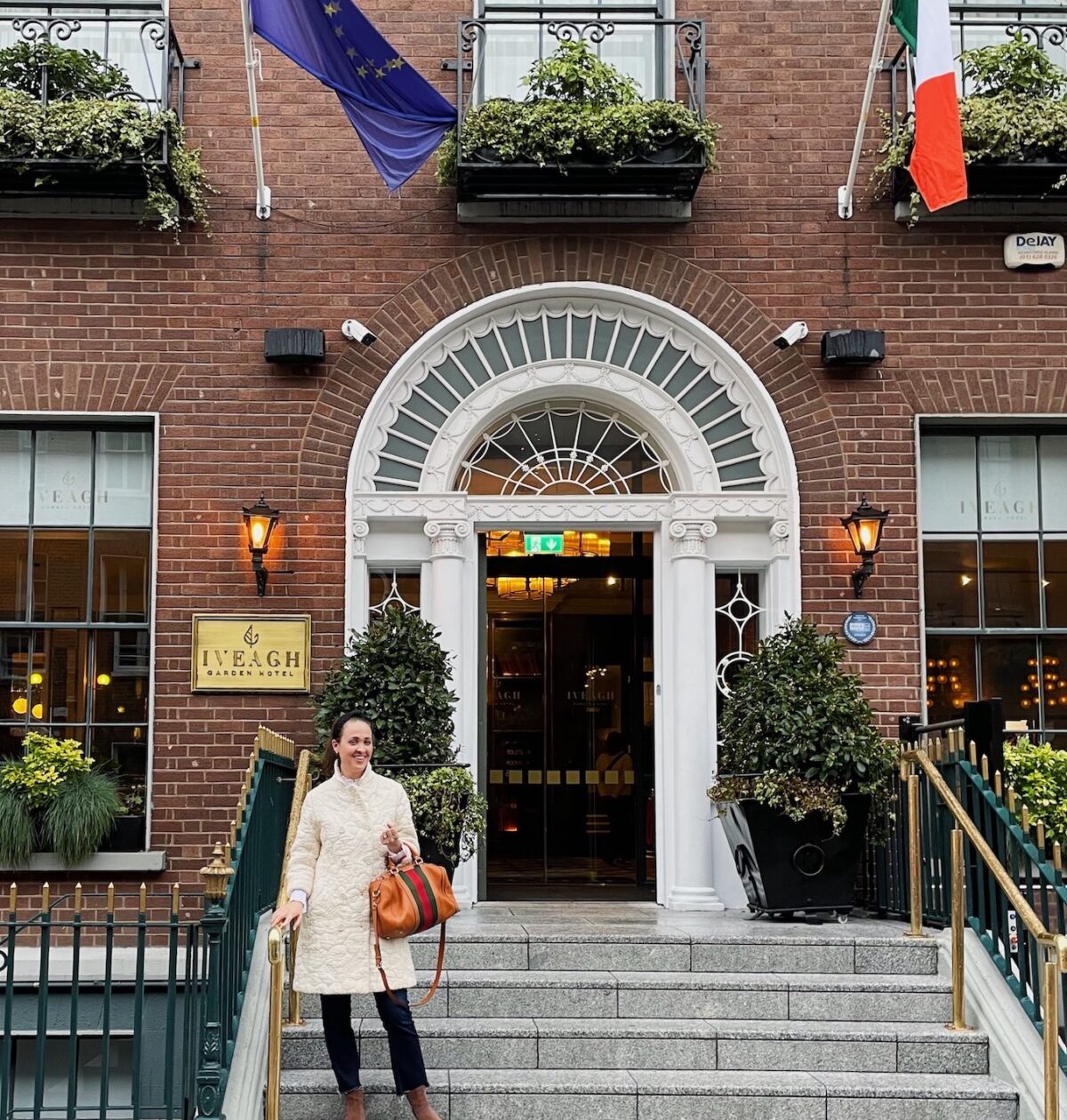 girl in dublin in vintage white coat